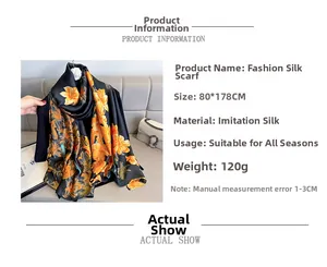 Detail view of floral print faux silk scarf with black background measuring 80x178CM