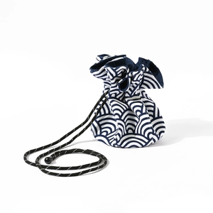Japanese seigaiha pattern drawstring pouch bag with blue wave motif and canvas fabric