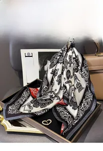 Macro detail of luxury silk twill square scarf with elegant floral patterns