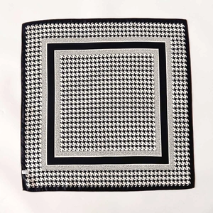 Classic houndstooth silk square scarf with elegant black border and subtle dot texture