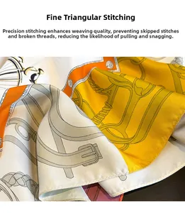 Close-up of fine triangular needle stitching on a silk scarf with equestrian patterns