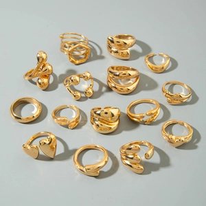 Set of 15 pieces of gold chunky rings featuring irregular heart and geometric designs