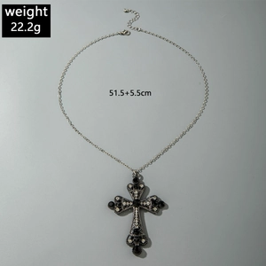 Detail view of gothic cross pendant necklace with black gems and silver chain size specs