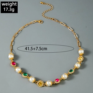Detail of vintage layered cross necklace with colorful gemstones and pearls, 17.3g weight
