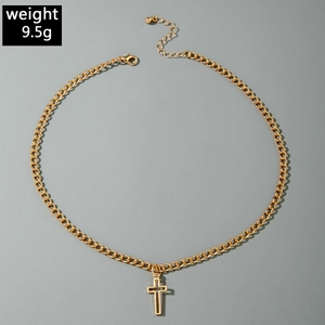 Detail of gothic cross pendant necklace with zircon layering and 9.5g weight info