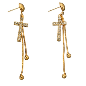 Boucles d'oreilles croix dorées avec strass brillants et longs pendentifs à pampilles