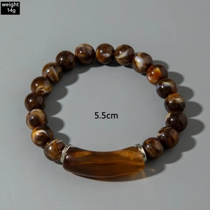 Detail view of brown beaded bracelet set with 14g weight and 5.5cm size specifications