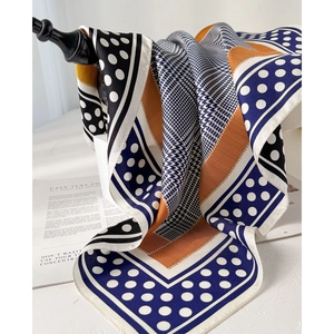 Classic 100% silk twill scarf featuring geometric prints and elegant orange stripes