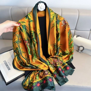 Elegant yellow silk scarf with green bamboo print and floral pattern for women