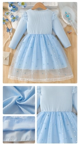 Detailed view of girls' light blue princess dress showing sequin mesh and lace hem