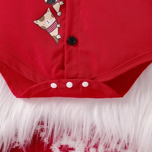Detail of red Christmas baby romper featuring cartoon elk print and snap buttons