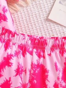 Pink tie-dye kids casual shorts with elastic pleated waistband and smooth fabric