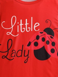 Close-up of Little Lady ladybug print on girls red cotton t-shirt with sharp detail