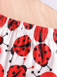 Girl's summer cotton shorts with ladybug print and comfortable elastic waistband details