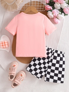Completo estivo da bambina in cotone con maglietta rosa e pantaloncini a scacchi neri