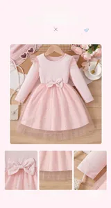 Detail of pink girls princess dress with gold star sequins and mesh embroidery