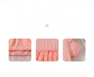 Detail of pink floral toddler dress showing smooth seams and ruffled sleeve craftsmanship