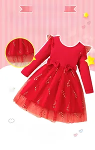 Detail of red knit bodice with bow accents and gold candy cane mesh skirt for girls