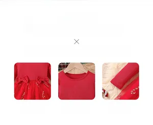 Detail of red knit mesh girl's dress showing sequined candy cane patterns and bow accents