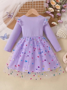Girls long sleeve princess dress with purple knit bodice and sequined polka dot mesh skirt