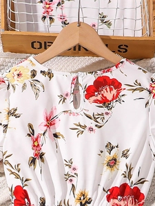 Girls' white floral summer dress with ruffled sleeves and back button detail