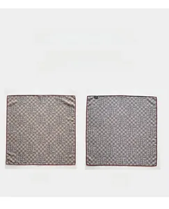 Detail view of double-sided silk wool square scarf with checkerboard and floral pattern