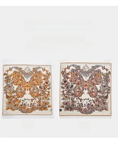 Detail of silk wool square scarf showing the double-sided butterfly and floral print pattern