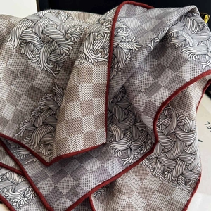 Luxurious silk wool scarf with checkered pattern and vintage prints and red contrast hem