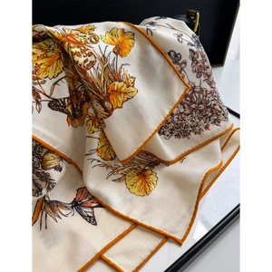 Silk wool square scarf with butterfly and maple leaf prints and orange rolled edges