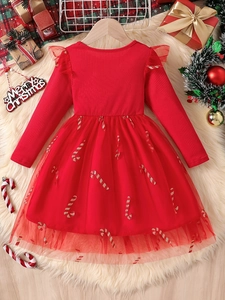Girl's red long sleeve Christmas tulle dress with glitter candy cane prints and bow detail