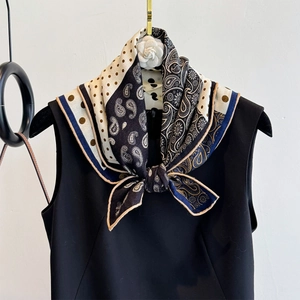 Elegant silk wool square scarf with paisley patterns and decorative camellia flower accessory