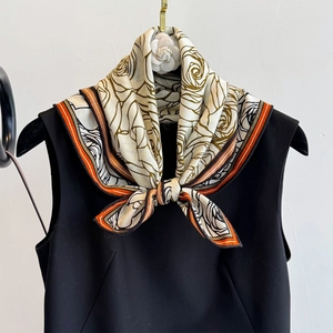 Vintage rose print silk wool scarf styled as a neckerchief on a black top