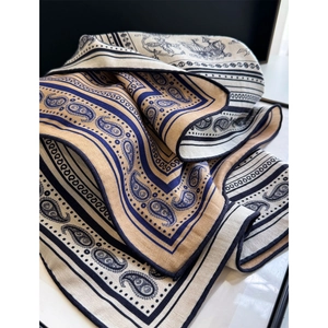 Silk wool square scarf with paisley nautical print and navy border in soft folds