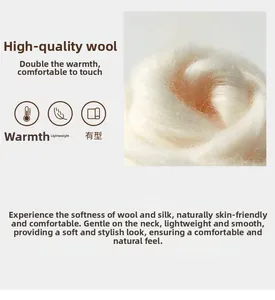 Close-up of premium silk and wool scarf fabric showing soft white texture and luster