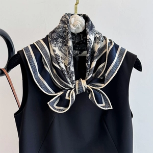 Elegant black and white floral printed silk wool square scarf with white camellia accent