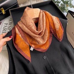 Elegant paisley print silk feeling chiffon scarf with vibrant orange and wine red stripes