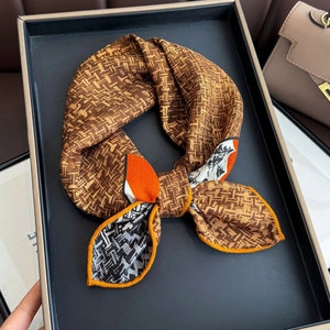 Dual-color silk wool scarf with retro geometric patterns tied in a stylish bow knot