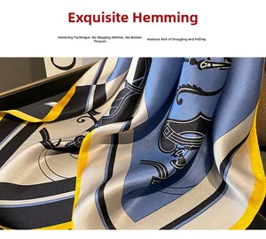Detailed close-up of the fine hemming craft and horse motif on this silk scarf