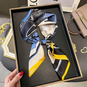 Silky silk scarf featuring contrast carriage geometric print in blue and white color blocks
