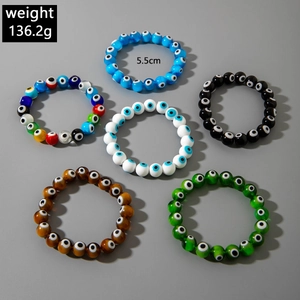 Detailed view of six colorful beaded evil eye stretch bracelets with weight and size specs
