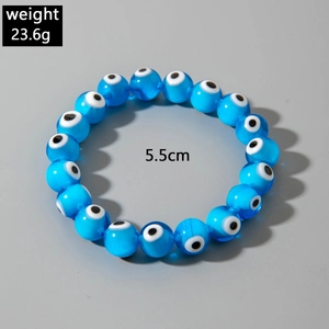 Detail shot of Evil Eye beaded bracelet showing 5.5cm inner diameter and 23.6g weight