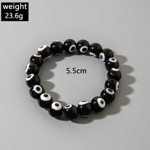 Detail shot of black Evil Eye beaded bracelet with 23.6g weight and 5.5cm inner diameter