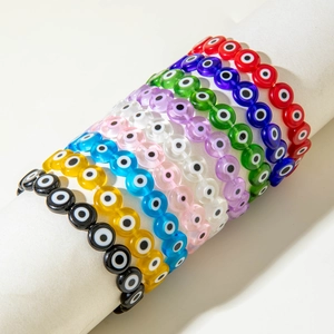 Bohemian evil eye beaded elastic bracelets in nine vibrant colors on display