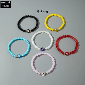 Detailed view of 6-piece bohemian evil eye beaded bracelets set weighing 48.1g