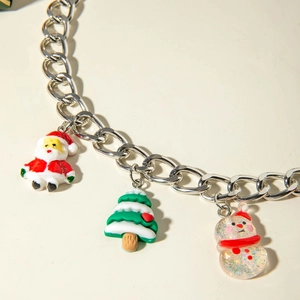 Christmas necklace with silver chain and resin charms of Santa, tree and snowman