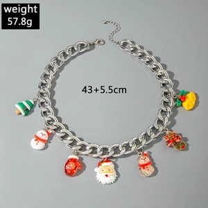 Close-up of Christmas necklace with enamel Santa, bell and tree charms, 43+5.5cm length