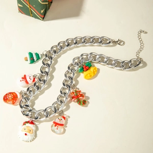 Detailed view of silver chain necklace with Santa, snowman and bell resin pendants