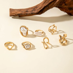 Bohemian gold alloy ring set with Baroque pearls and geometric irregular designs