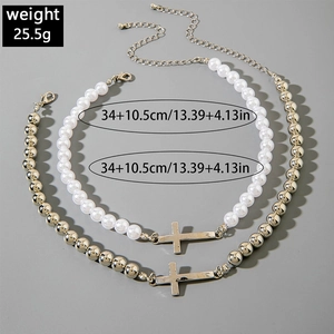 Detailed view of layered silver cross necklaces with white pearls and 25.5g weight