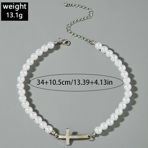 Detailed view of pearl necklace with cross pendant and size dimensions